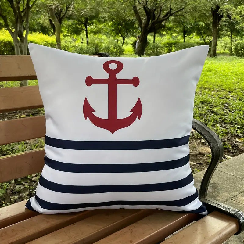 Modern white outdoor pillow cover featuring a centered red anchor silhouette and navy blue horizontal stripes for nautical décor - 18x18 - Coastal Pillows Plus