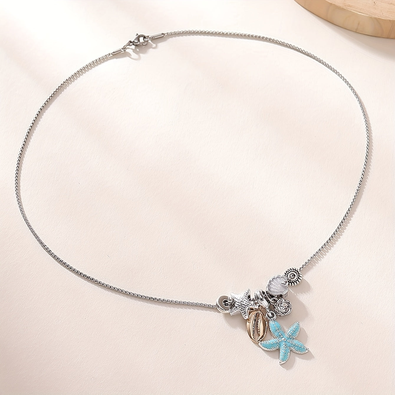 Starfish & Seashell Pendant Necklace – Rhinestone Accent