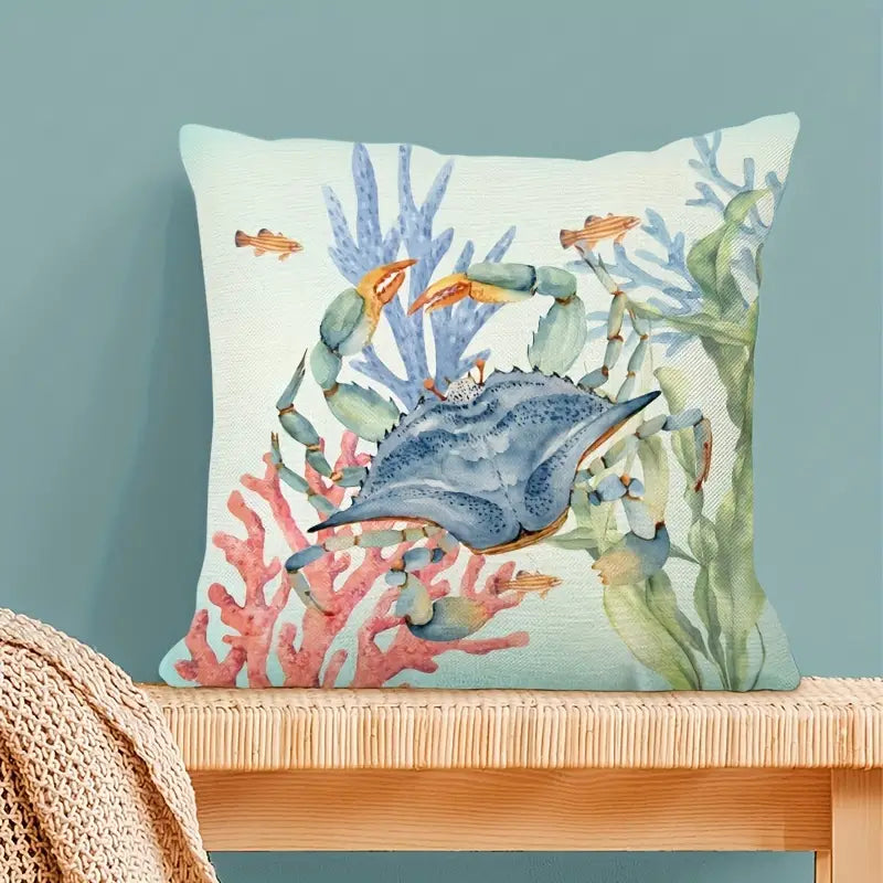 Square coastal pillow cover featuring a watercolor illustration of a blue crab among pink and blue coral reefs with small tropical fish for nautical décor - 18x18 - Coastal Pillows Plus