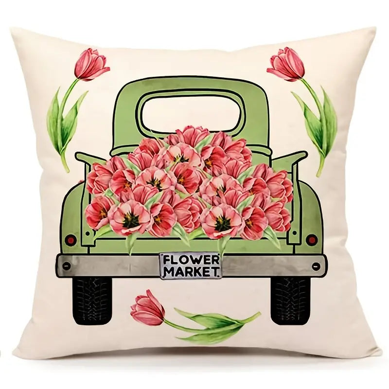 Decorative pillow cover featuring a vintage green truck filled with pink tulips and “Flower Market” text on a neutral background.