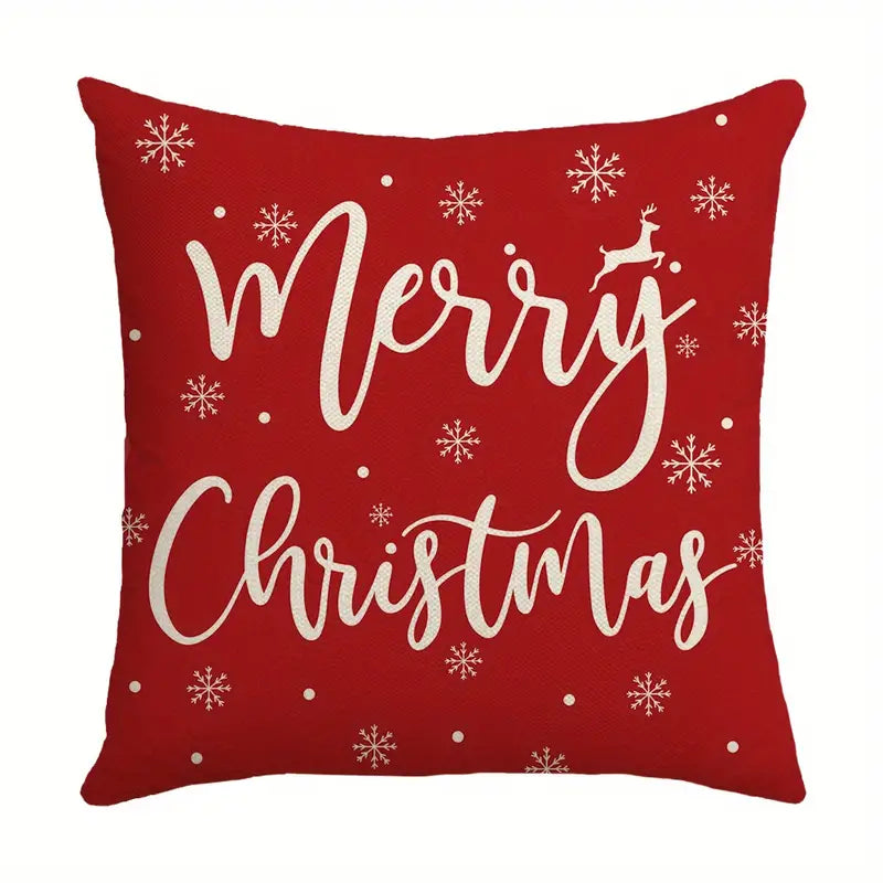 Red Merry Christmas pillow cover with deer silhouette and snowflakes in a classic holiday design