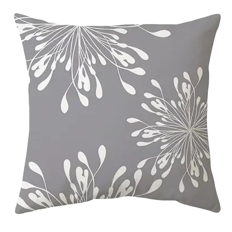 Whimsical 18x18 inch pillow cover with white dandelion puff or burst patterns scattered across a solid grey background for playful home décor – Coastal Pillows Plus.