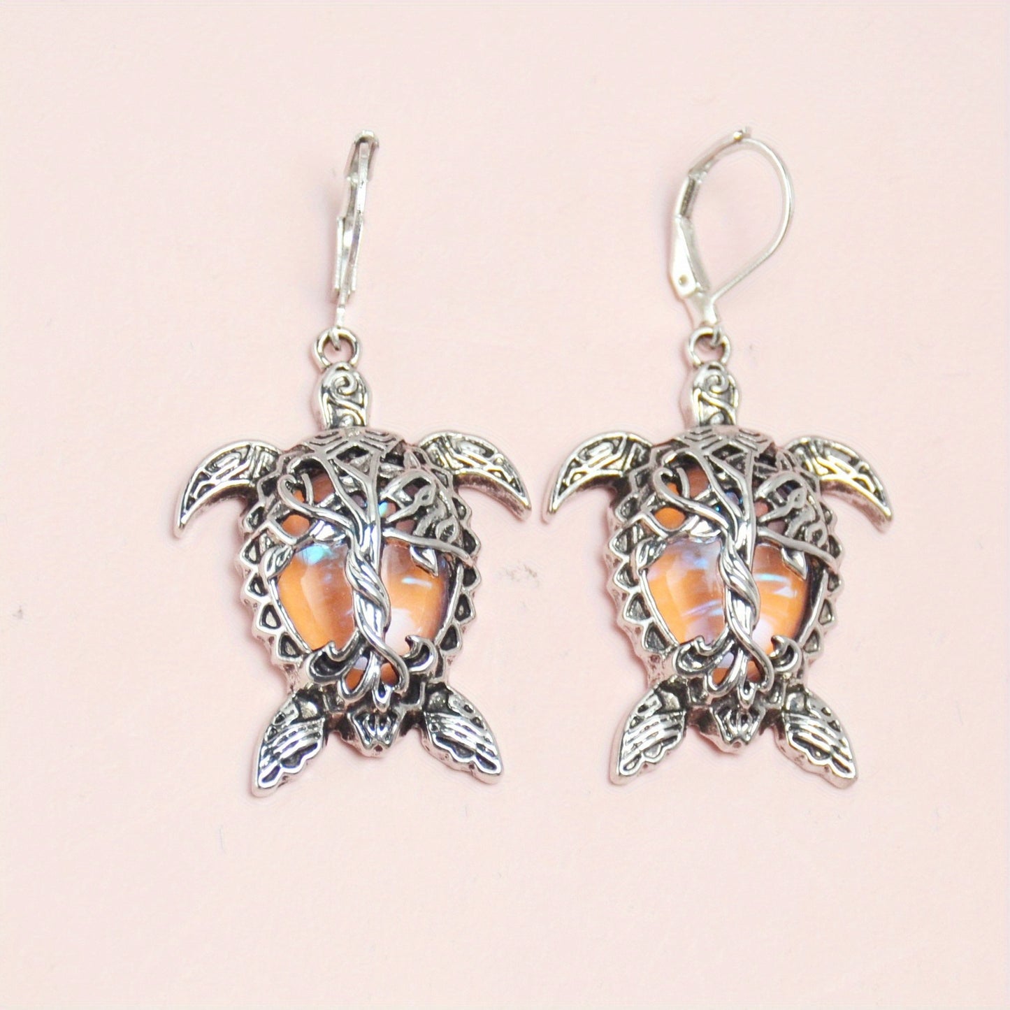 Playful 3-piece silver-tone sea turtle jewelry set with matching necklace and earrings for a coastal home décor vibe.