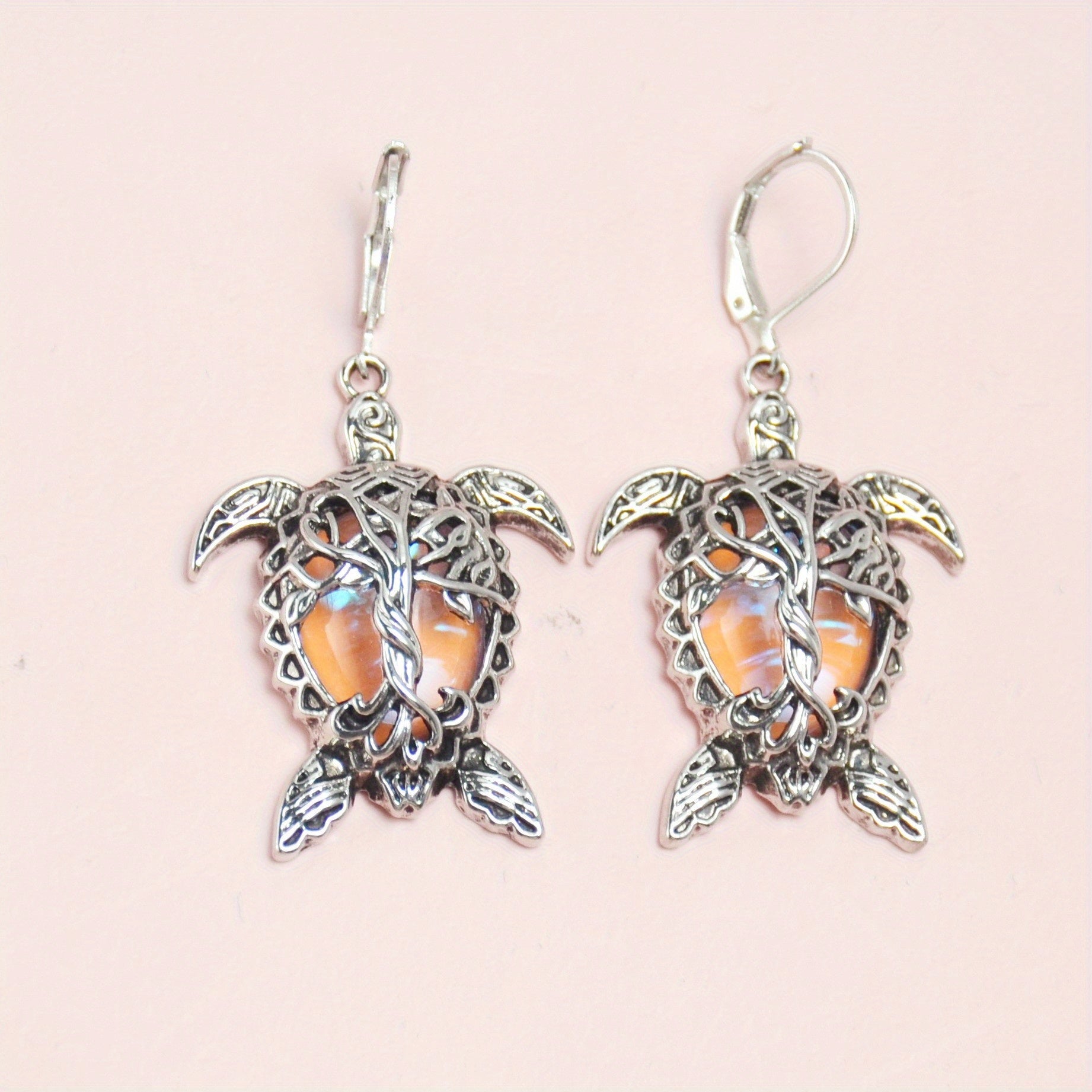 Playful 3-piece silver-tone sea turtle jewelry set with matching necklace and earrings for a coastal home décor vibe.