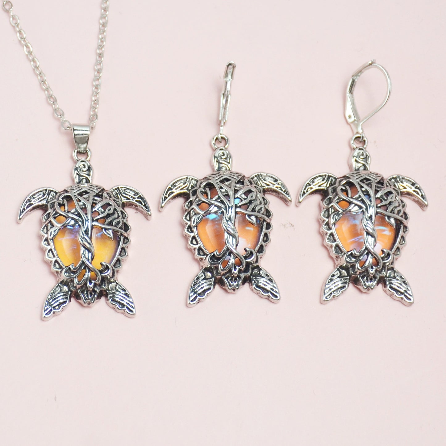 Playful 3-piece silver-tone sea turtle jewelry set with matching necklace and earrings for a coastal home décor vibe.
