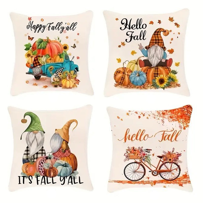 Four linen pillow covers with Hello Fall sayings, gnomes, pumpkins, vintage truck, and bicycle in autumn tones.