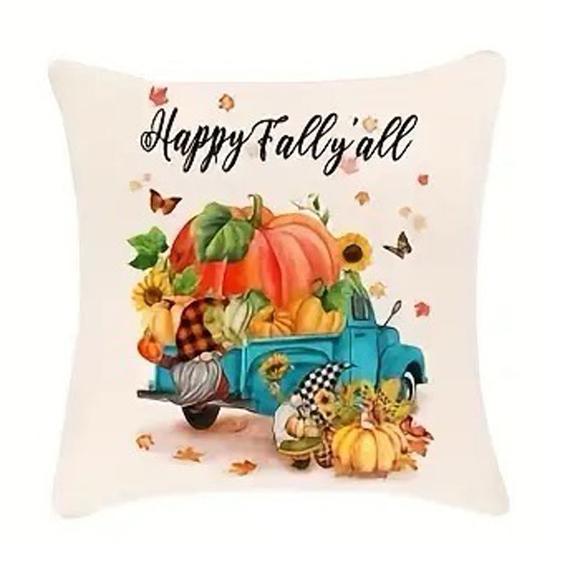 Linen pillow cover with “Happy Fall Y’all” text above a vintage truck filled with pumpkins and fall leaves.