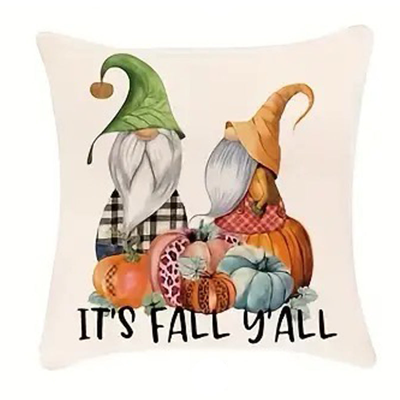 Linen pillow cover with “It’s Fall Y’all” text and two gnomes standing among pumpkins in autumn colors.
