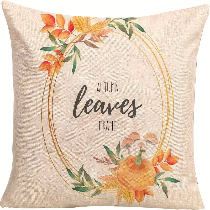 Linen pillow cover with golden circular frame, autumn leaves, pumpkin, and mushrooms on neutral background.