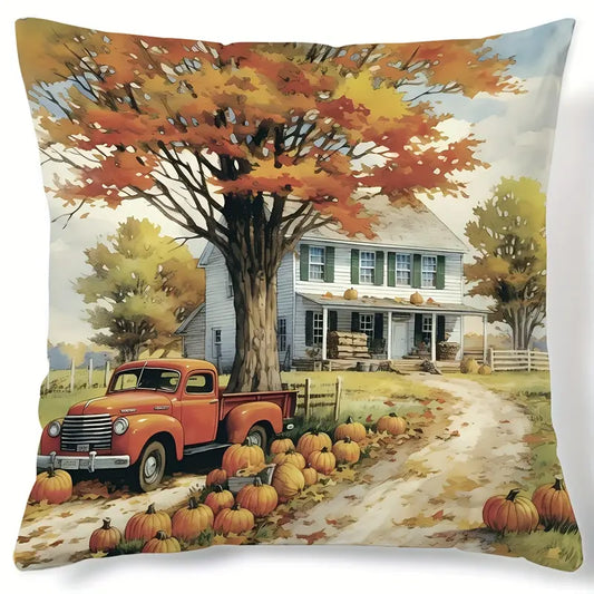 Pillow cover featuring vintage orange truck, pumpkins, large maple tree, and white farmhouse in a fall countryside scene.