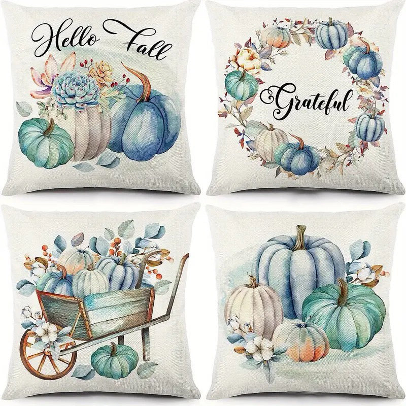 Four pillow covers with teal and cream pumpkins, Hello Fall script, Grateful wreath, wheelbarrow, and pumpkin cluster.