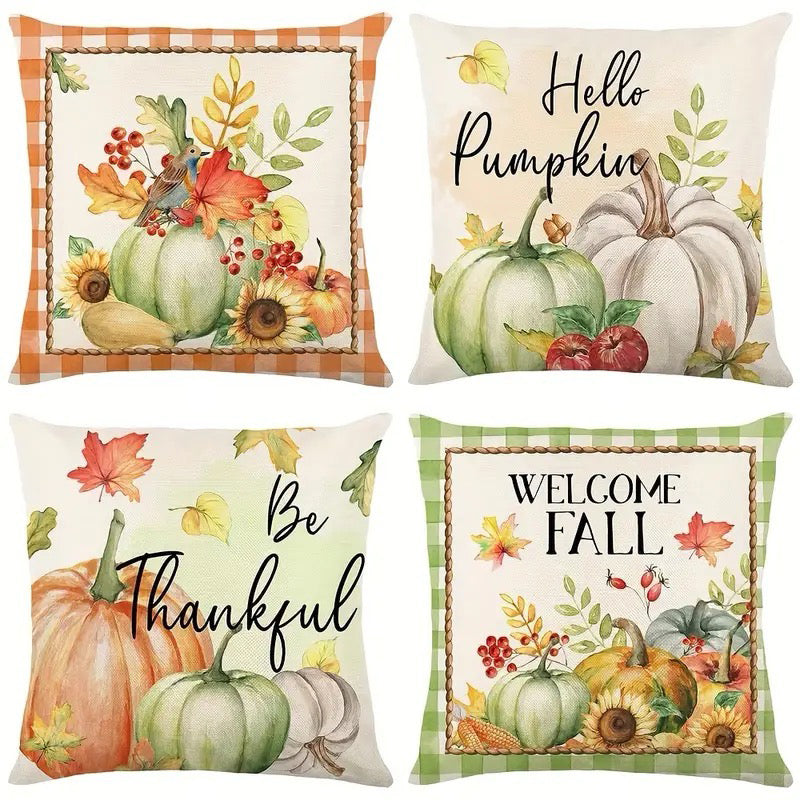 Four pillow covers with pumpkins, Hello Pumpkin, Be Thankful, Welcome Fall text, and autumn foliage artwork.
