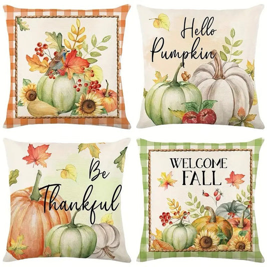 Four pillow covers with pumpkins, Hello Pumpkin, Be Thankful, Welcome Fall text, and autumn foliage artwork.
