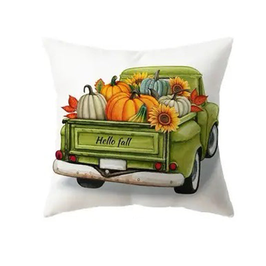 Pillow cover with green vintage truck carrying pumpkins and sunflowers with Hello Fall text.