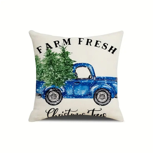 Navy blue outdoor pillow cover featuring a blue truck carrying Christmas trees with Farm Fresh Christmas Trees text.