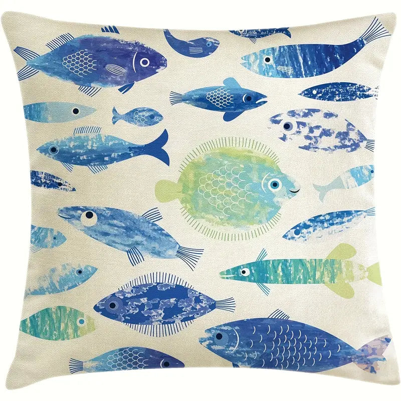 18"x18" linen pillow cover featuring a repeating pattern of blue and green stylized fish on a cream background.