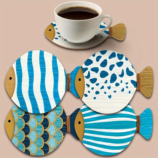 Blue and white fish shaped wooden coasters with striped and scale patterns with a coffee cup on one coaster.