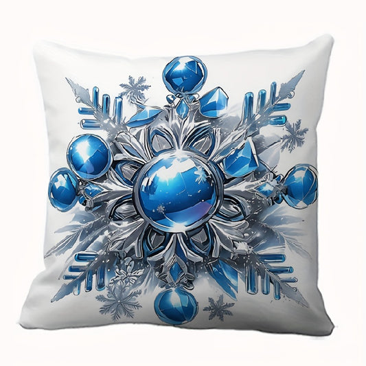 White pillow cover with large blue ornament snowflake design in silver and blue winter colors