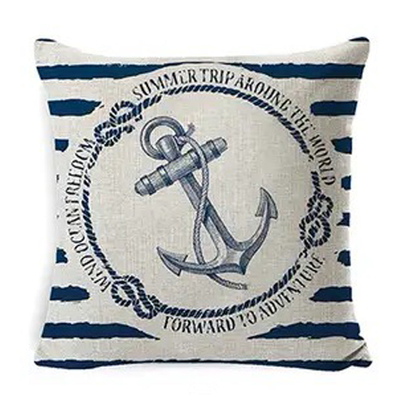 Linen pillow cover featuring an anchor emblem over blue vertical stripes with nautical script and decorative detailing.