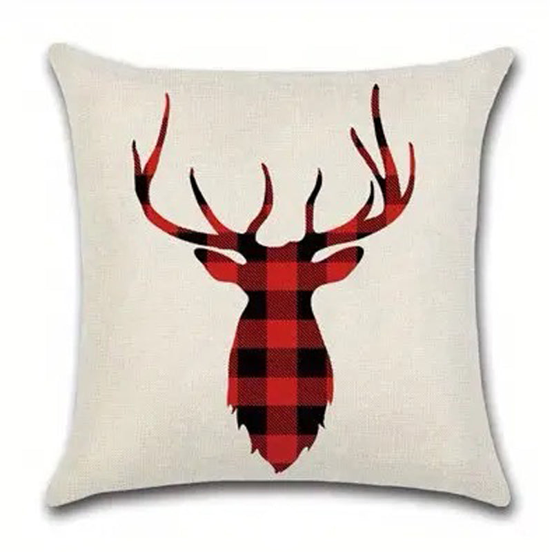 Red and black buffalo plaid pillow cover with a centered reindeer silhouette