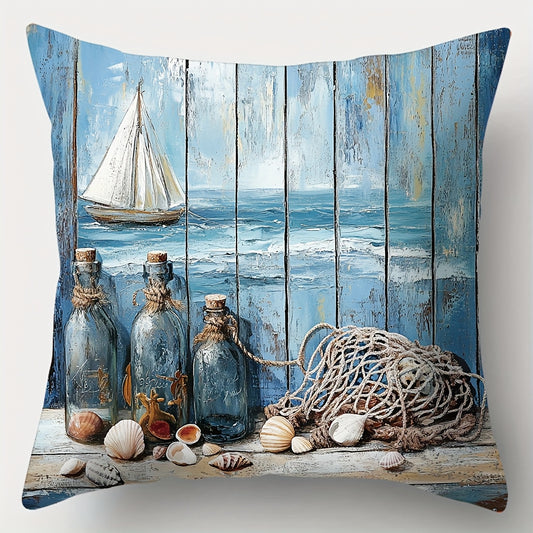 Coastal pillow cover featuring glass bottles, fishing net, seashells, and a sailboat illustration on a rustic blue wood background.