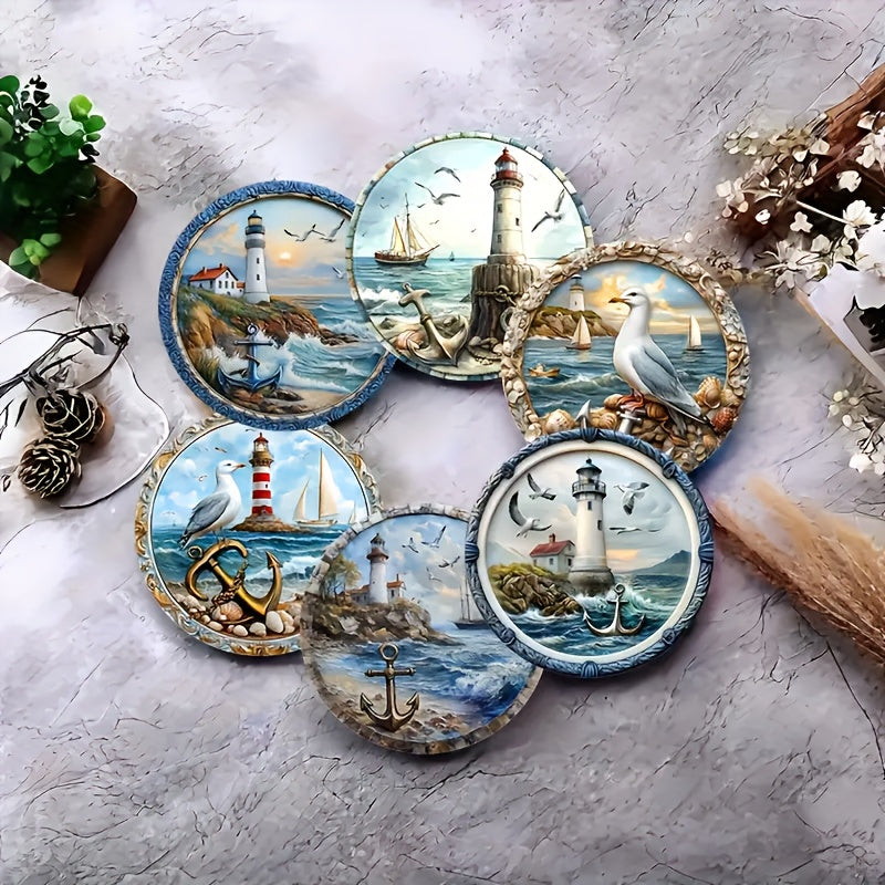 Round wooden coasters with lighthouse, sailboat, anchor, and seabird coastal scenes arranged on a tabletop.