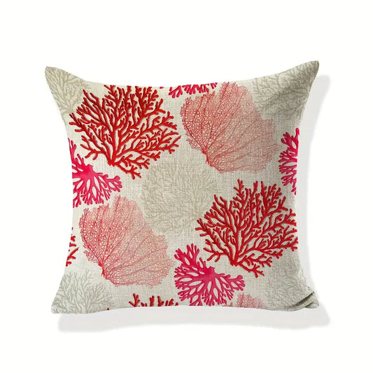 Coastal pillow cover featuring red and pink sea fan coral patterns on a neutral background.
