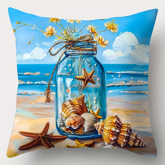 Coastal pillow cover featuring a glass jar filled with seashells and starfish on a sandy beach background with blue sky and ocean.