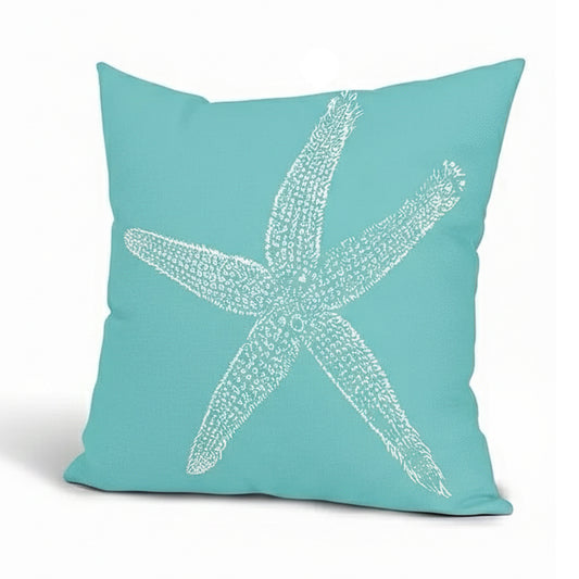 Cerulean blue linen pillow cover featuring a white starfish design on textured fabric background.