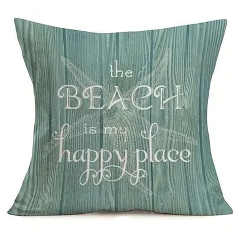 Pillow cover featuring the text “the BEACH is my happy place” on a teal wood grain-style background.