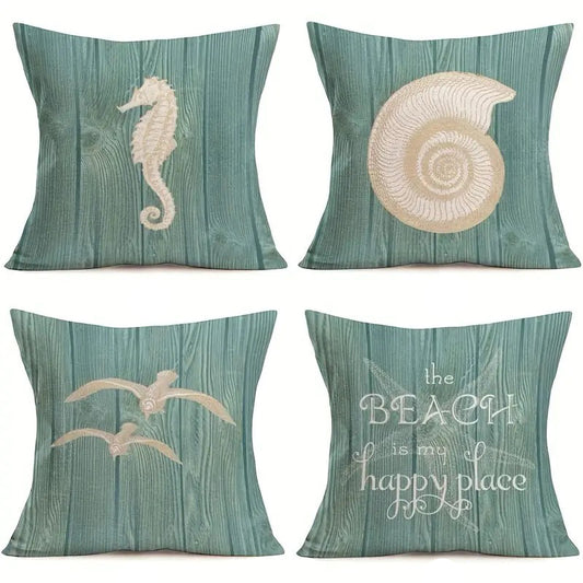 Set of four pillow covers featuring a seahorse, shell, birds, and a beach quote on a teal wood grain-style background.