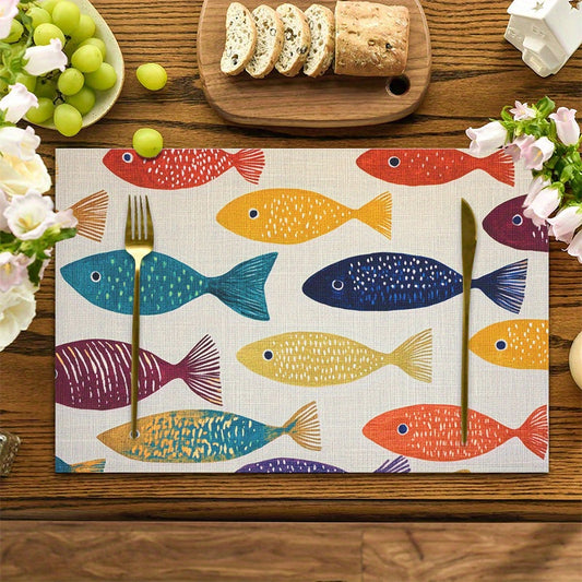 Colorful fish coastal placemats set of four with multicolor fish pattern on dining table.
