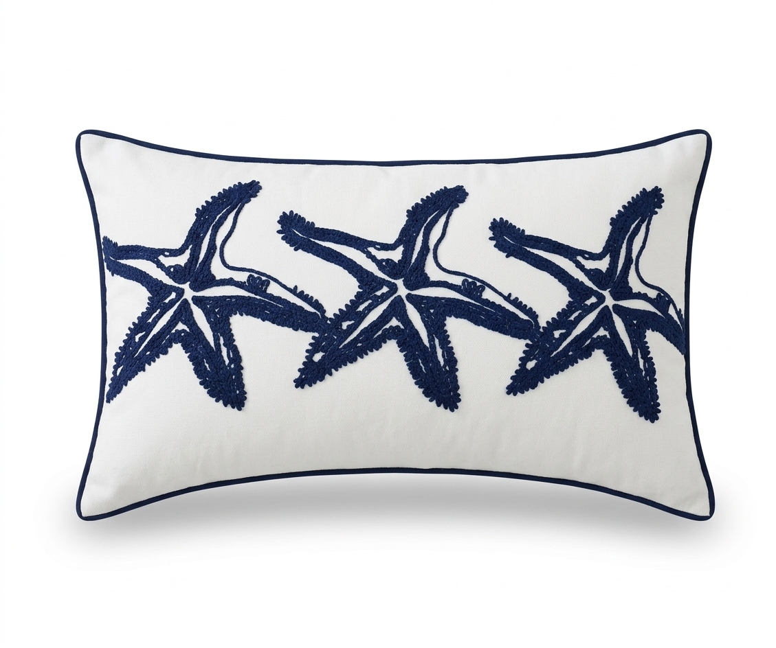 12x20 lumbar pillow cover with navy embroidered starfish in a horizontal band on a light fabric background for coastal decor.