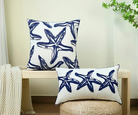 Navy embroidered starfish pillow cover set including one 20x20 square pillow cover and one 12x20 lumbar pillow cover for coastal home decor.