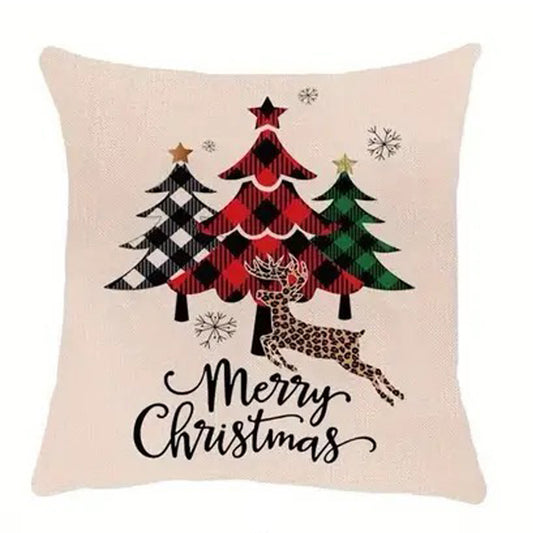 Farmhouse Christmas pillow cover featuring plaid Christmas trees, a reindeer and Merry Christmas text.