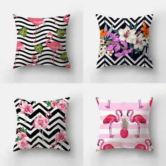 Set of four 18x18 decorative pillow covers featuring flamingos and floral designs with black and white chevron or stripe backgrounds and pink accent elements.