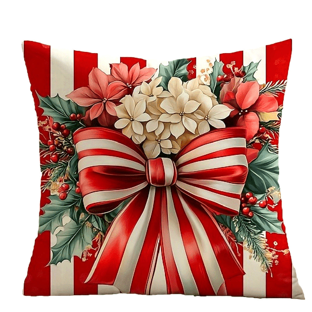 Red and white striped pillow cover with a ribbon bow and floral arrangement