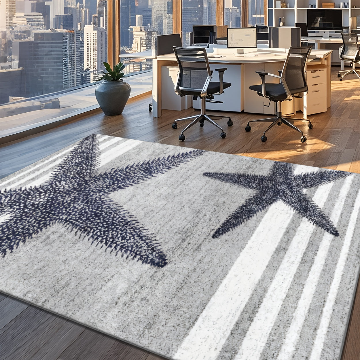 Coastal area rug featuring layered starfish patterns in gray, white, and navy blue tones.