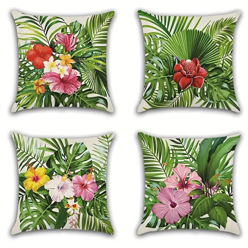 Set of four 18x18 decorative pillow covers featuring hibiscus flowers and green palm leaves in varied floral compositions on a light background.
