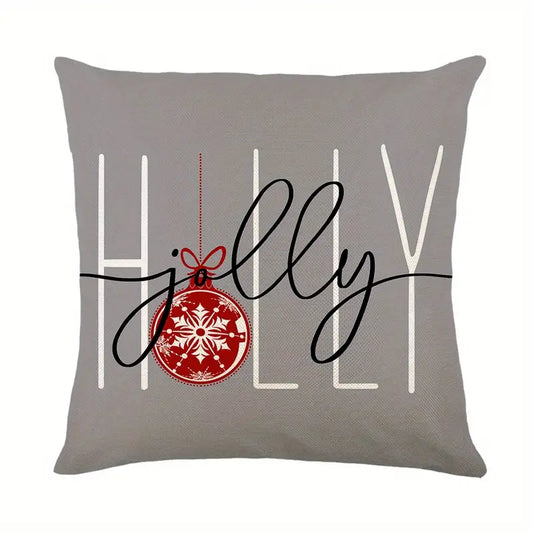 Festive 18x18 inch gray pillow cover with "Holly Jolly" typography and a red snowflake ornament graphic for holiday decor – Coastal Pillows Plus