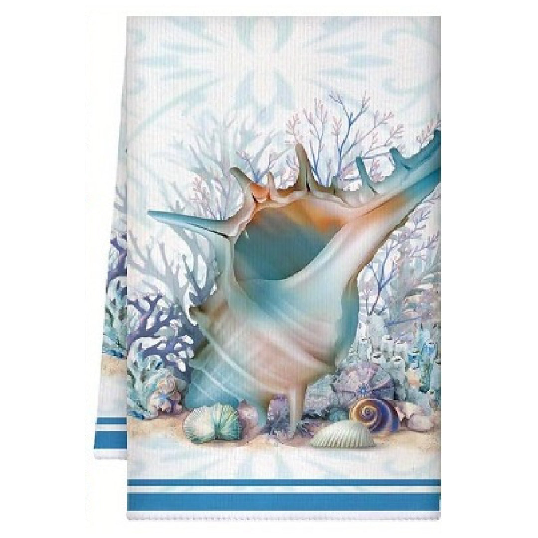 Towel with a large shell and underwater scene design on a white background
