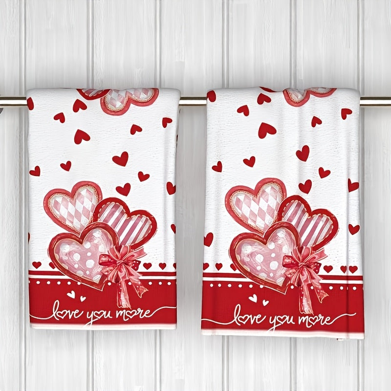 Ultra-soft 2-piece 16x24" red and white microfiber kitchen towels with hearts, bowknots, and “love you more” text, styled on a countertop for kitchen décor – Coastal Pillows Plus.