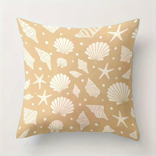 Pillow with beige and white shell pattern on a beige background