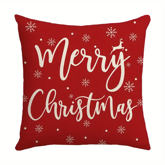 Red Merry Christmas pillow cover with deer silhouette and snowflakes in a classic holiday design