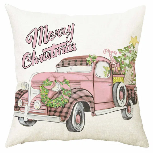 Pink truck Christmas pillow cover with Merry Christmas text and tree in truck bed in watercolor holiday design