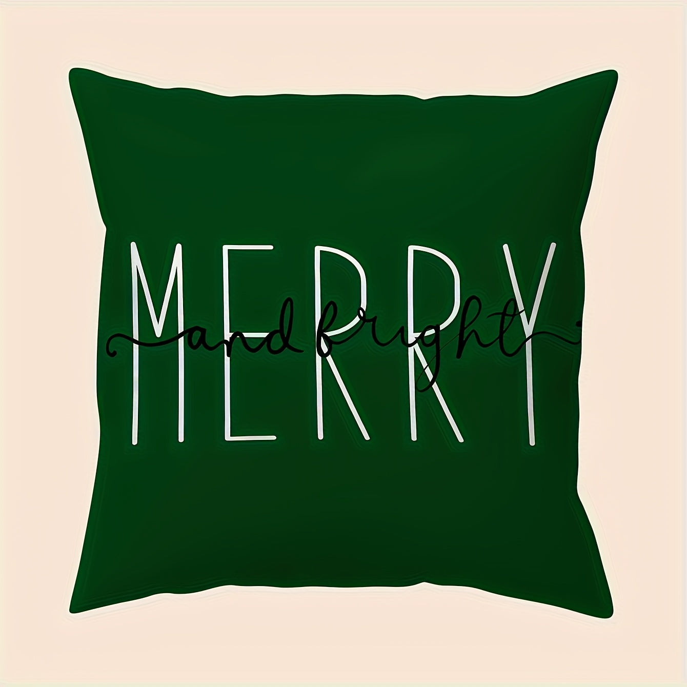 Green pillow cover with the word merry in large white lettering