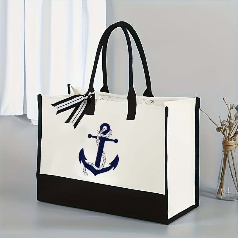 Large navy blue anchor tote bag in a durable canvas-polyester blend for beach or coastal décor.