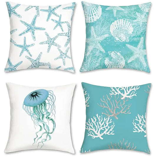 Coastal turquoise and golden 18x18 inch pillow cover with nautical starfish, seashell, jellyfish, and coral patterns, styled on a sofa for coastal home décor – Coastal Pillows Plus