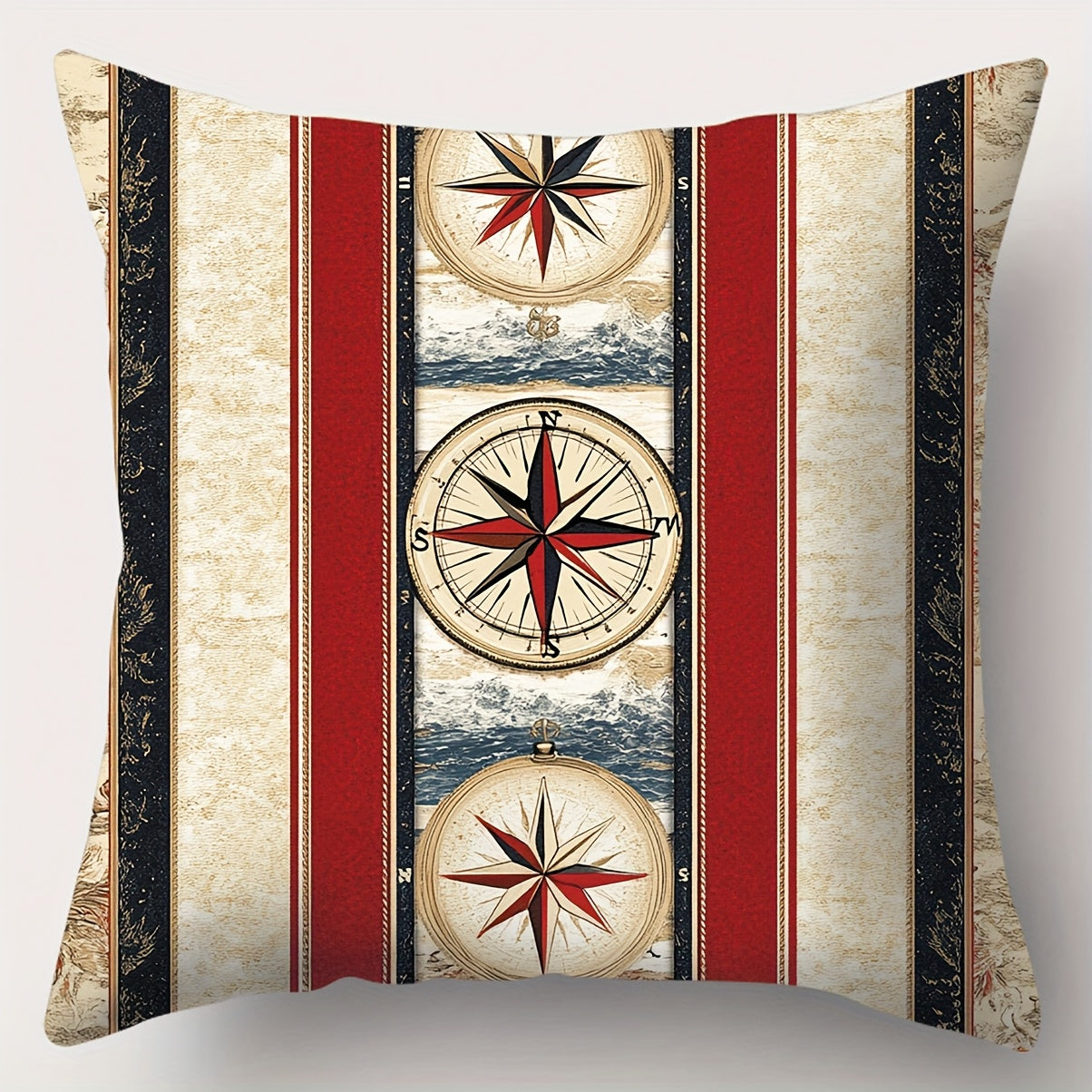 Square nautical pillow cover featuring a red, navy, and ivory stacked compass design over vertical stripes with maritime accents and hidden zipper closure.