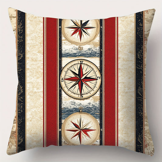 Square nautical pillow cover featuring a red, navy, and ivory stacked compass design over vertical stripes with maritime accents and hidden zipper closure.